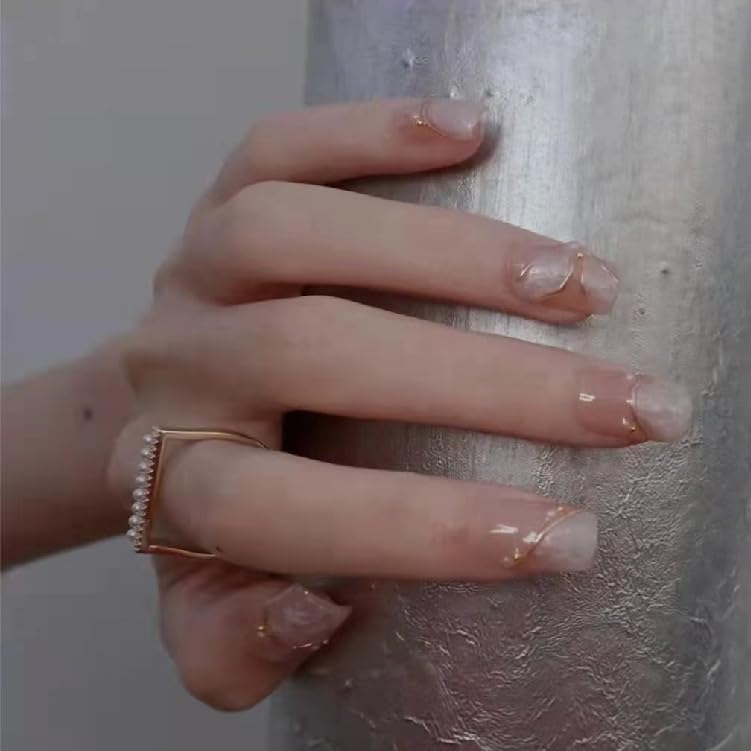 GLORS pearlescent white base nails highlighting shimmering finish for special occasions.