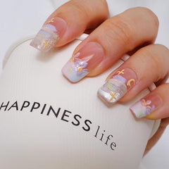 GLORS Purly handcrafted press-on nails with subtle shimmer for chic at-home manicures.