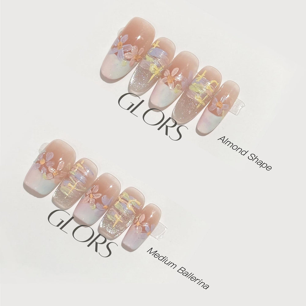 GLORS Purly nails with delicate pastel flowers for romantic garden-inspired style.