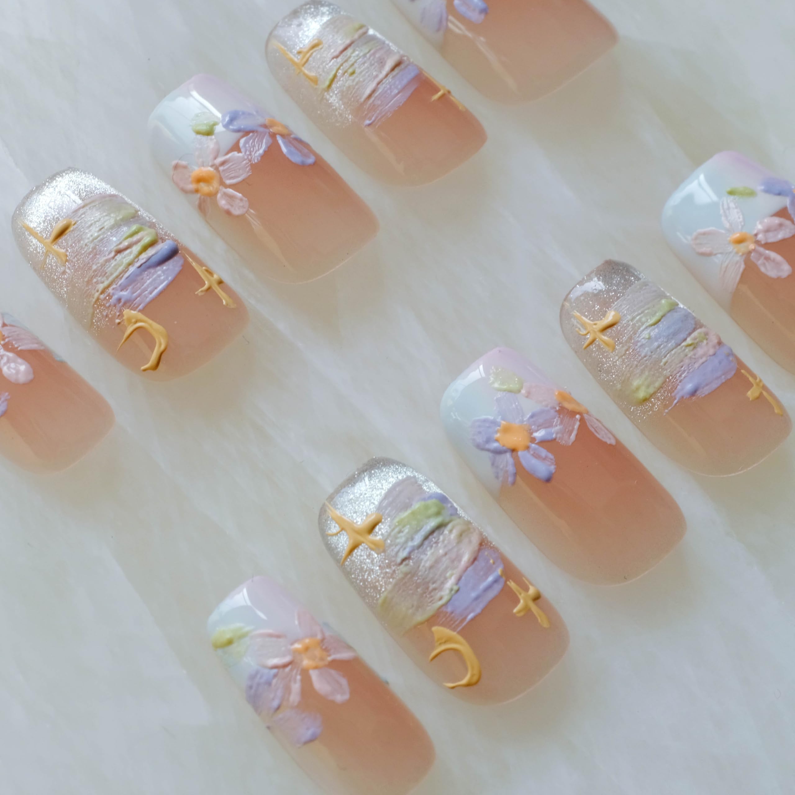 GLORS Purly nails in medium ballerina length balance elegance and practicality.