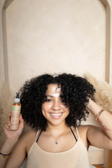 Glossed by Nae Voodoo Hair Growth Oil scene application with easy scalp massage