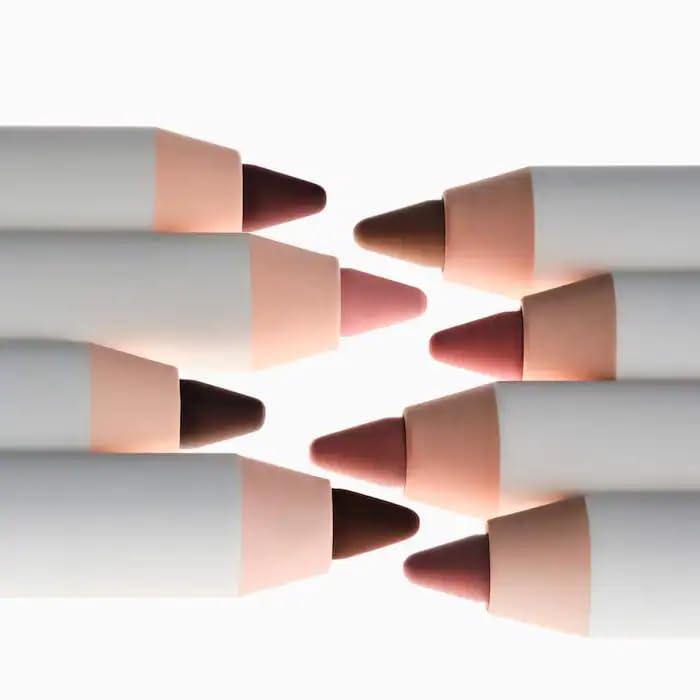 Glossier Bit Lip Liner twist-cap close-up showing sleek design.