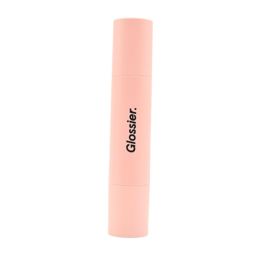Glossier Cloud Paint dual-ended brush with retractable bristle head for precise powder blush diffusion