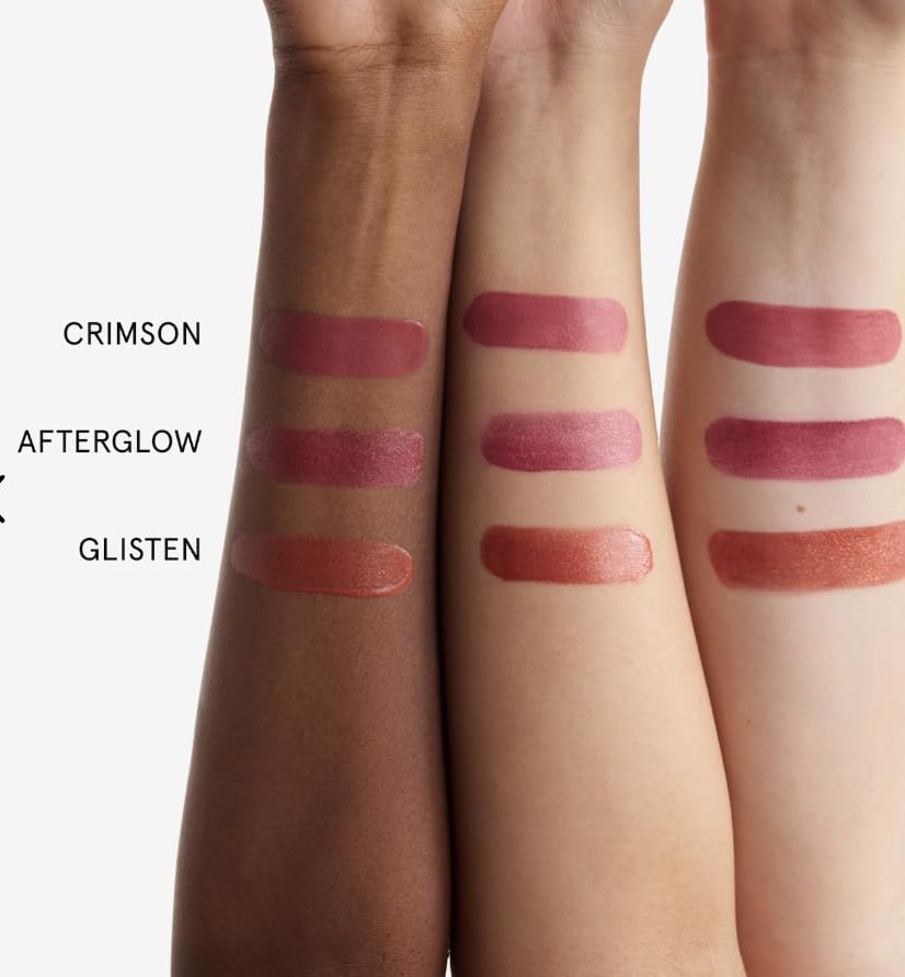 Glossier Cloud Paint Glisten shimmer swatch for luminous cheek glow.