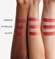 Glossier Cloud Paint Glisten shimmer swatch for luminous cheek glow.