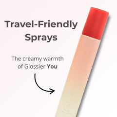 Glossier You thumbprint bottle close-up highlights personal scent experience.