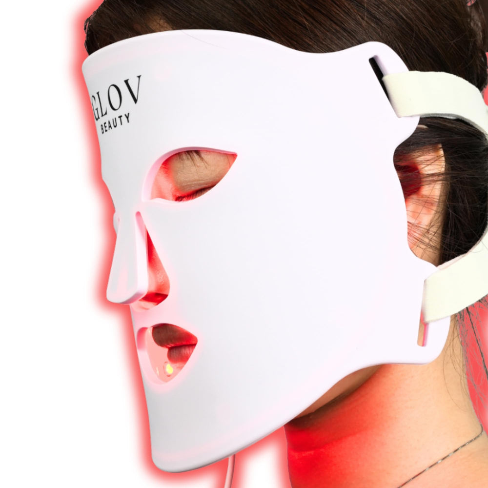 Glov Beauty LED mask on face for at-home rejuvenation and precision red-blue light therapy.