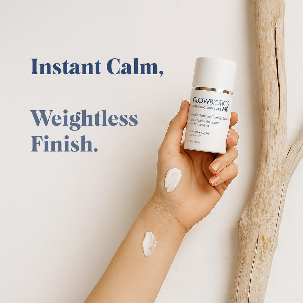 Application shot of Glowbiotics Calming Lotion on the face surface.