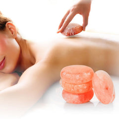 Glowyn Pink massage stone disc designed for therapy sessions and home relaxation