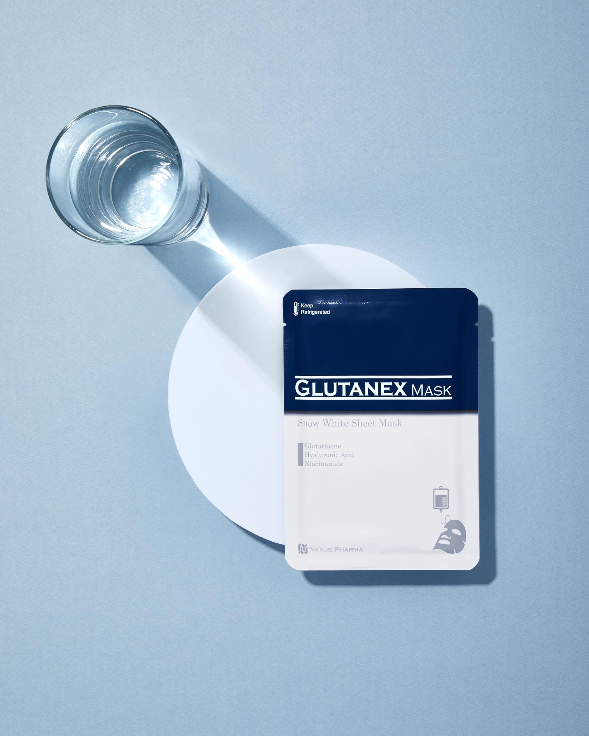 Applying Glutanex Snow White Sheet Mask to nourish dull skin tone