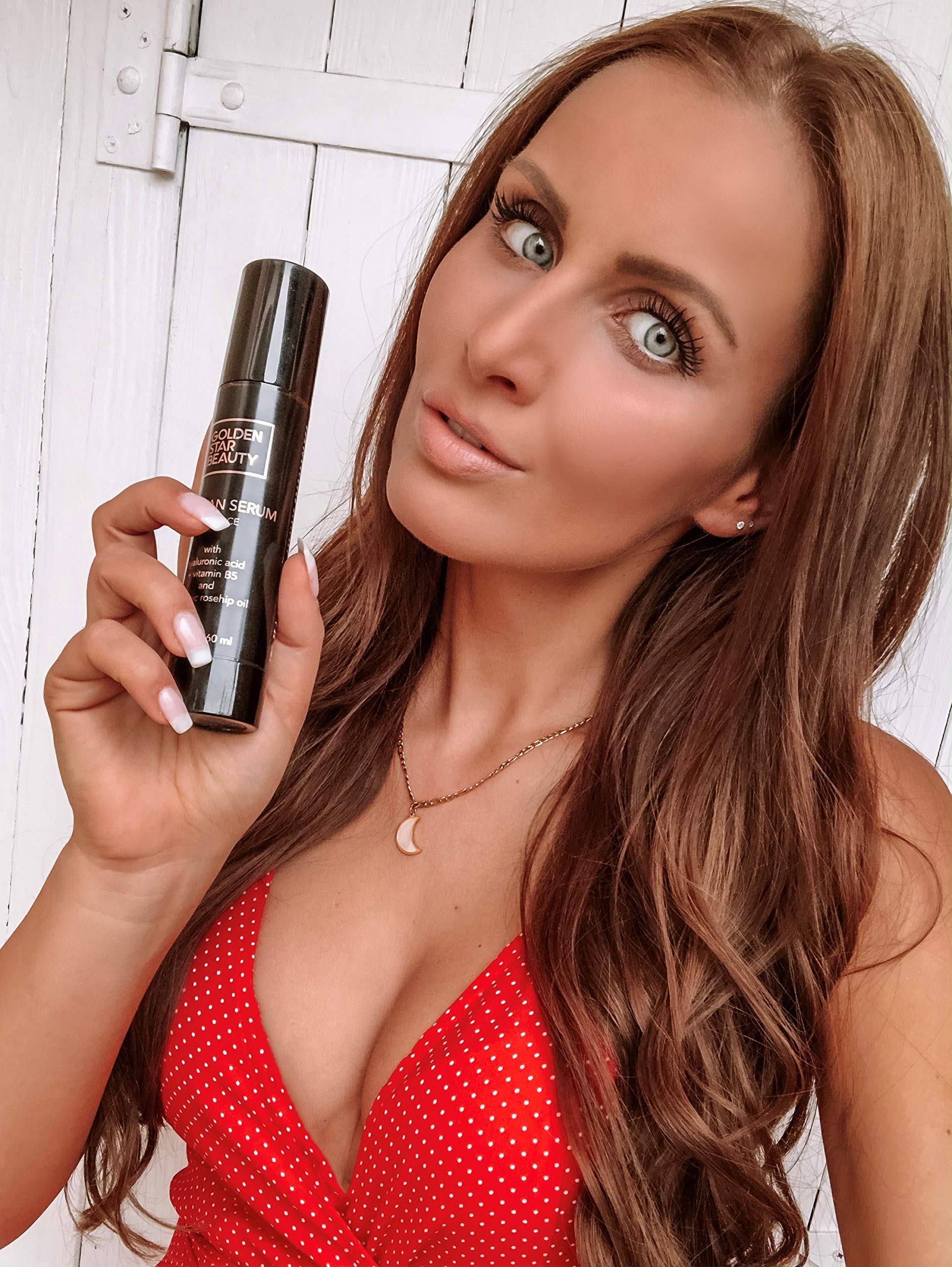 GOLDEN STAR BEAUTY Self tan serum being applied for a gradual tan.