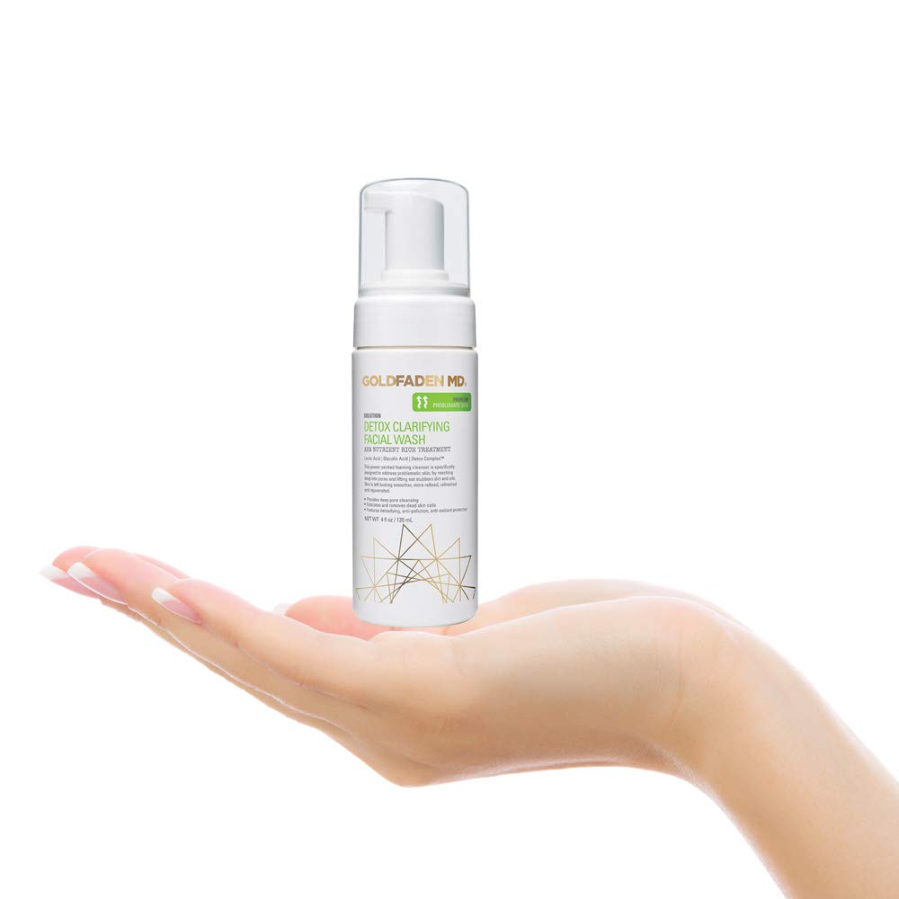 Lather spreading across skin shows thorough cleansing action with the detox formula.