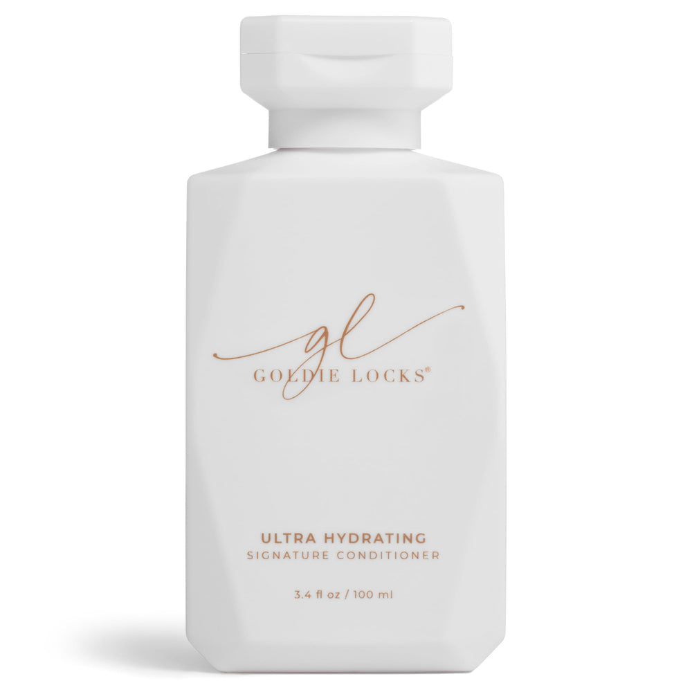 Goldie Locks Ultra Hydrating Conditioner bottle pour shows travel-friendly shine opportunity