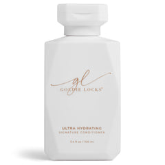 Goldie Locks Ultra Hydrating Conditioner bottle pour shows travel-friendly shine opportunity