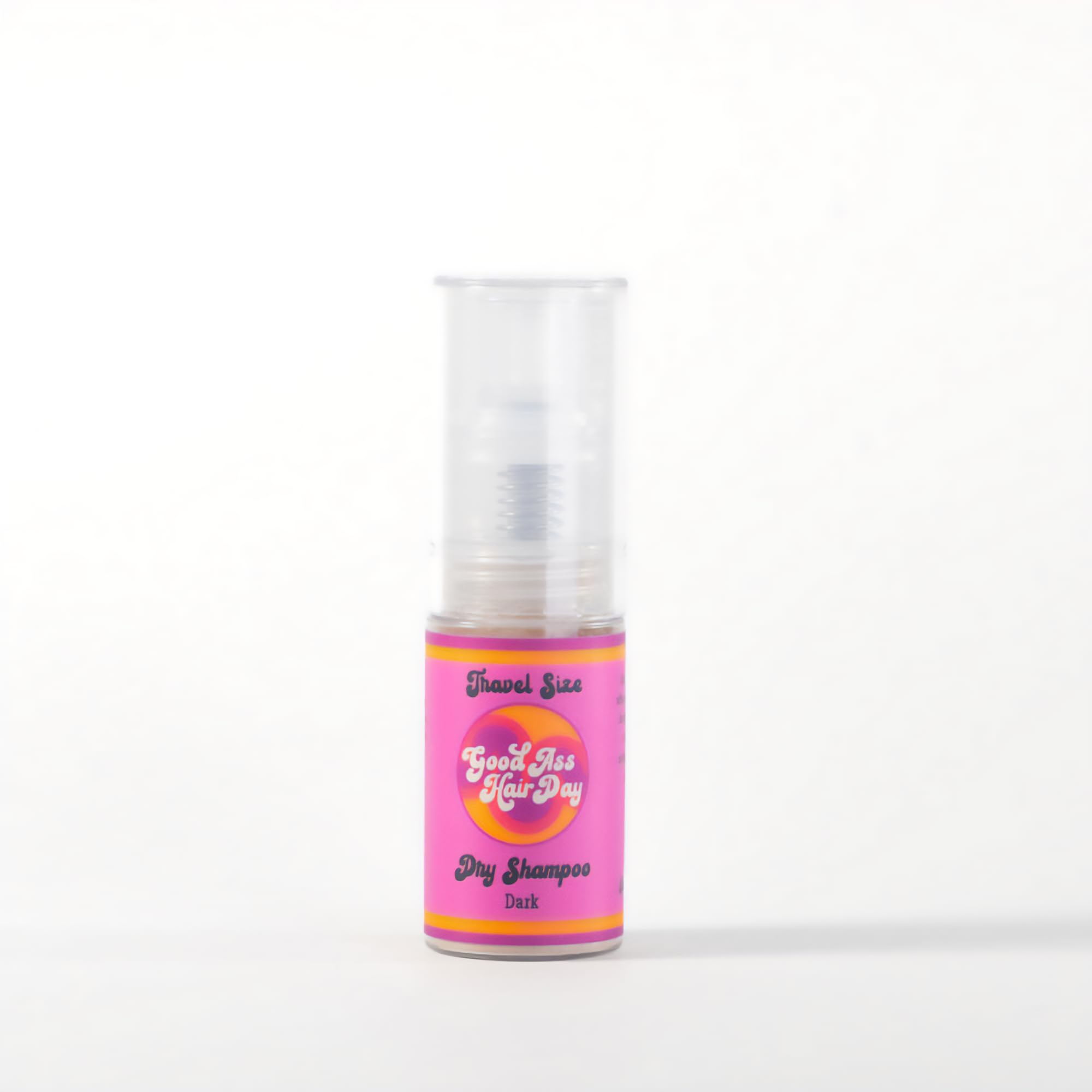 Good A- Hair Day dry shampoo powder in dark packaging refreshes hair between washes with oil absorption.