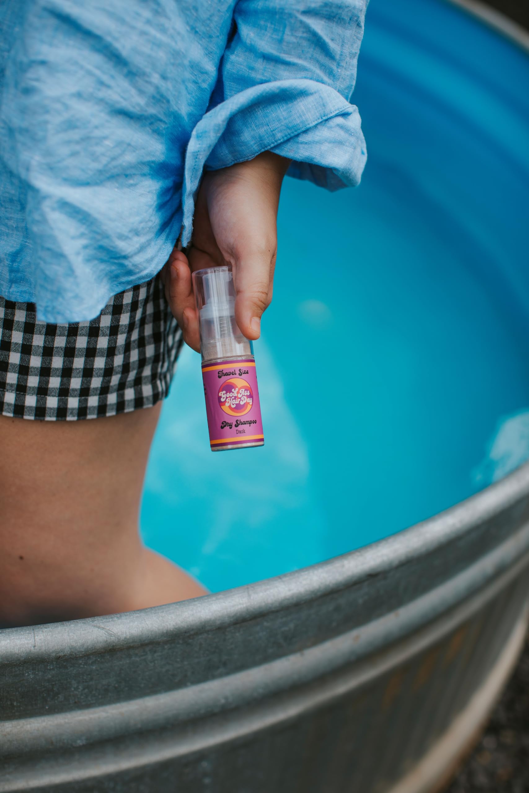 Good A- Hair Day travel size fits in bag for on-the-go use.