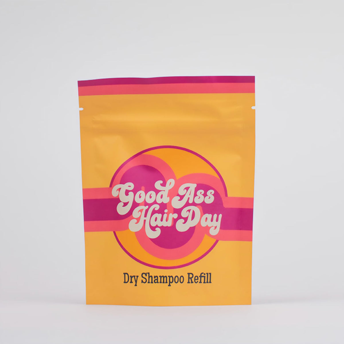 Good Ass Hair Day dry shampoo refill vanilla packaging highlights eco-friendly, travel-ready design.