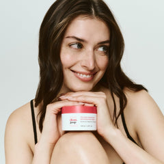 Good Clean Goop Body Smoother applied to hands for daily moisture