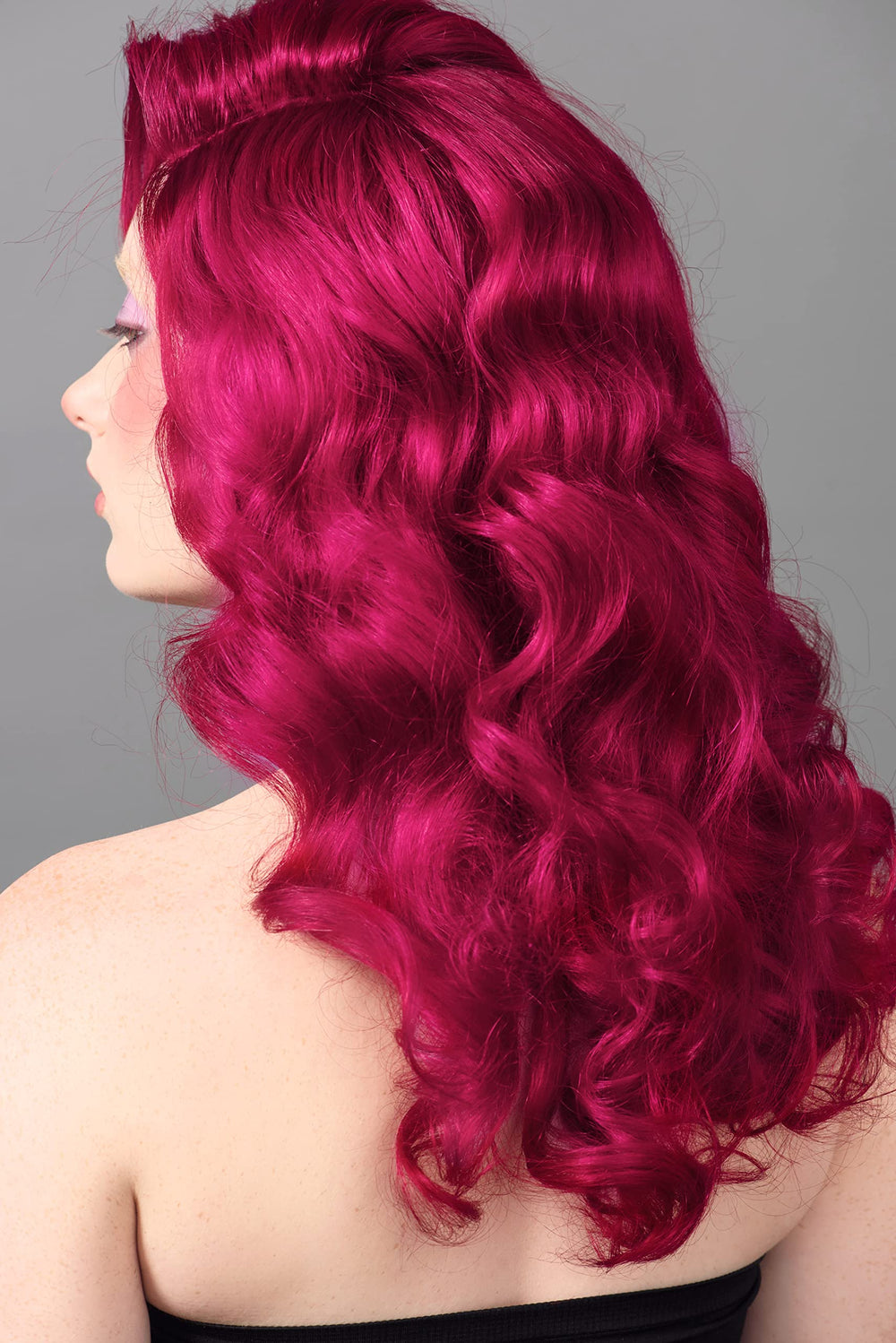 Good Dye Young color swatch shows rich magenta pink on light hair.