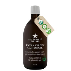 Goodby​e Company castor oil in amber bottle supports hair growth and skin hydration.