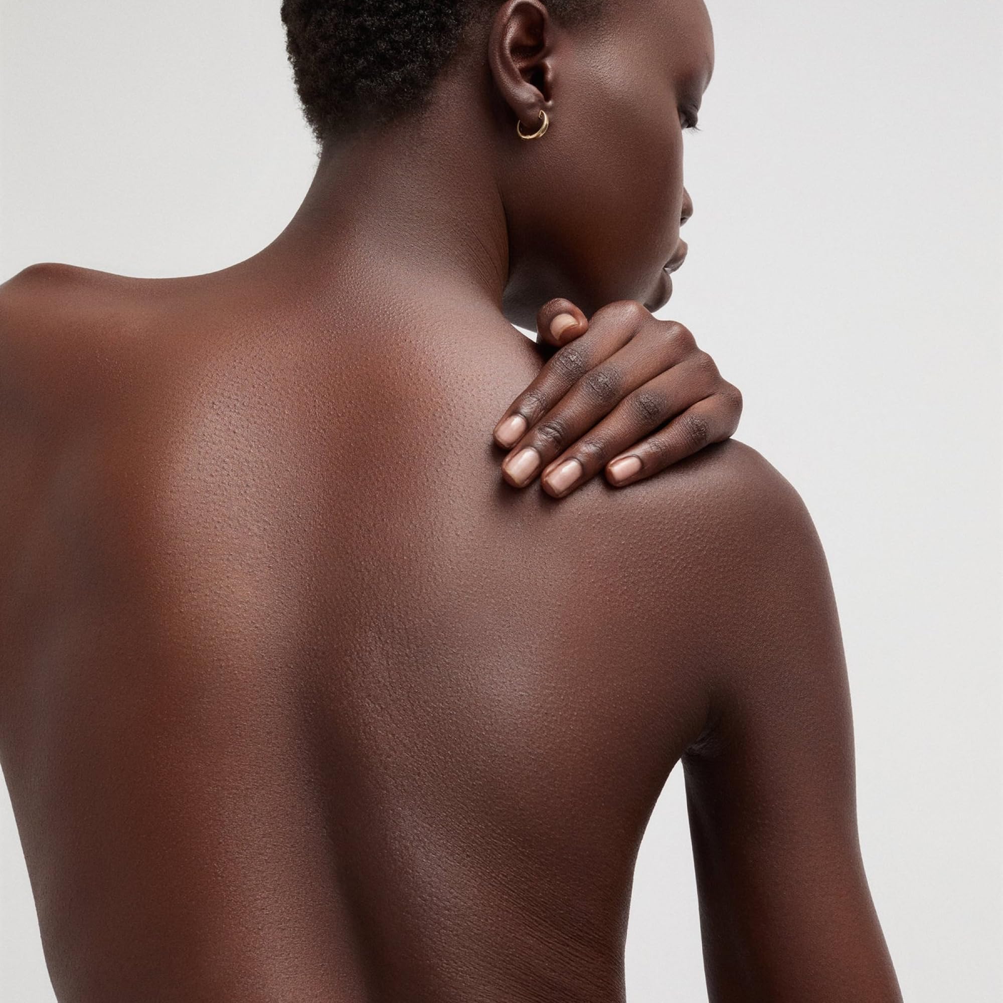 Goop Beauty Body Butter in hand demonstrating ultrahydrating cream
