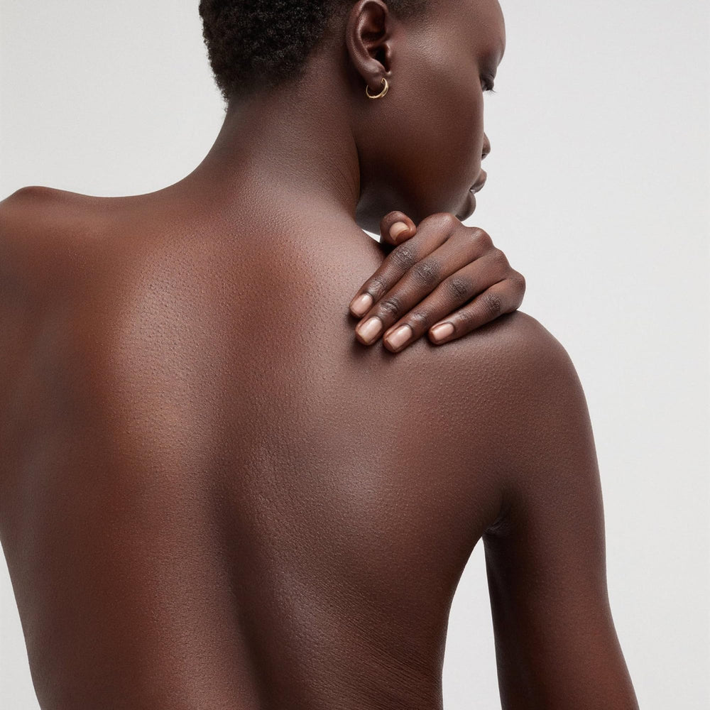 Goop Beauty Body Butter in hand demonstrating ultrahydrating cream