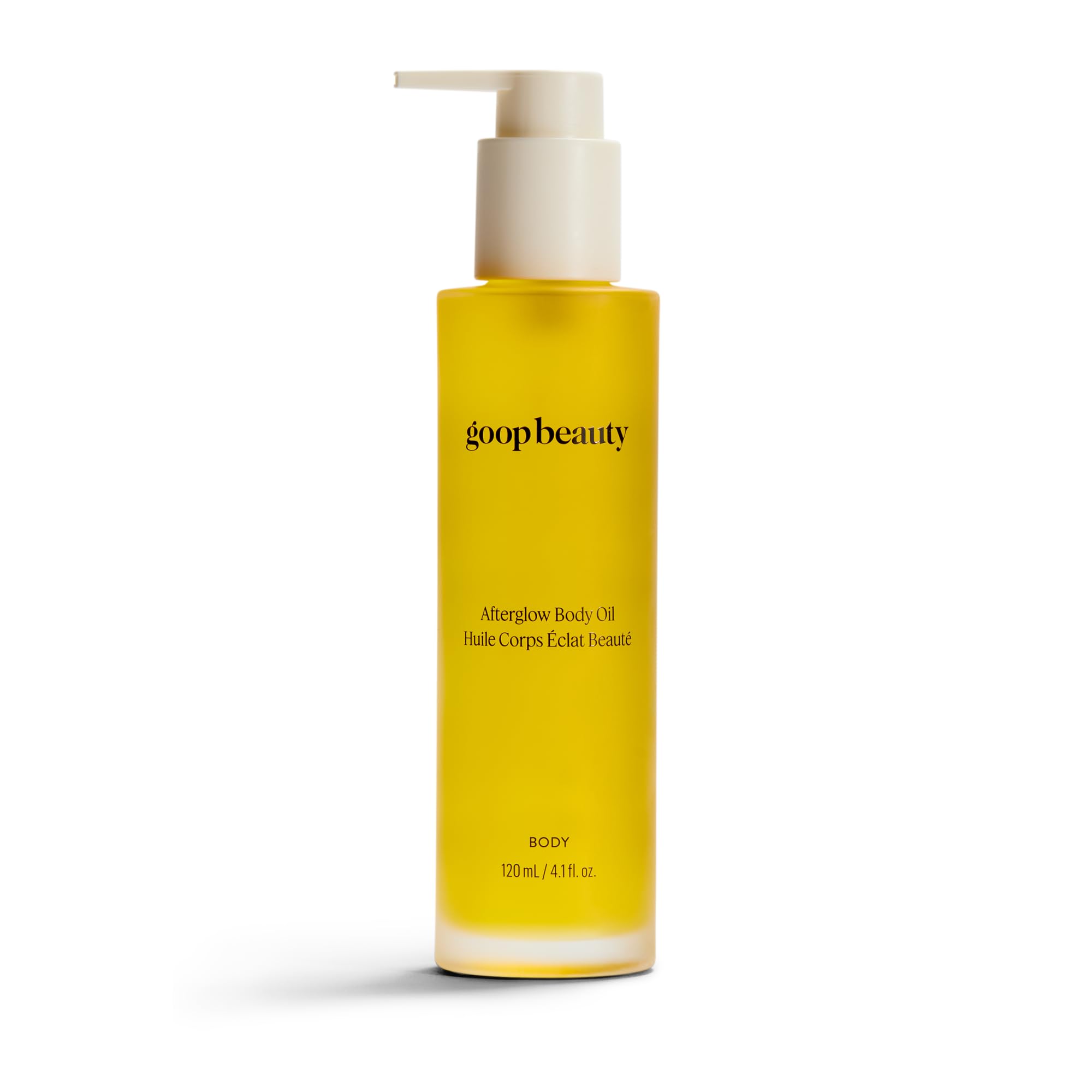 goop Beauty Body Oil bottle with pour showing luxurious, quick-absorb hydration.
