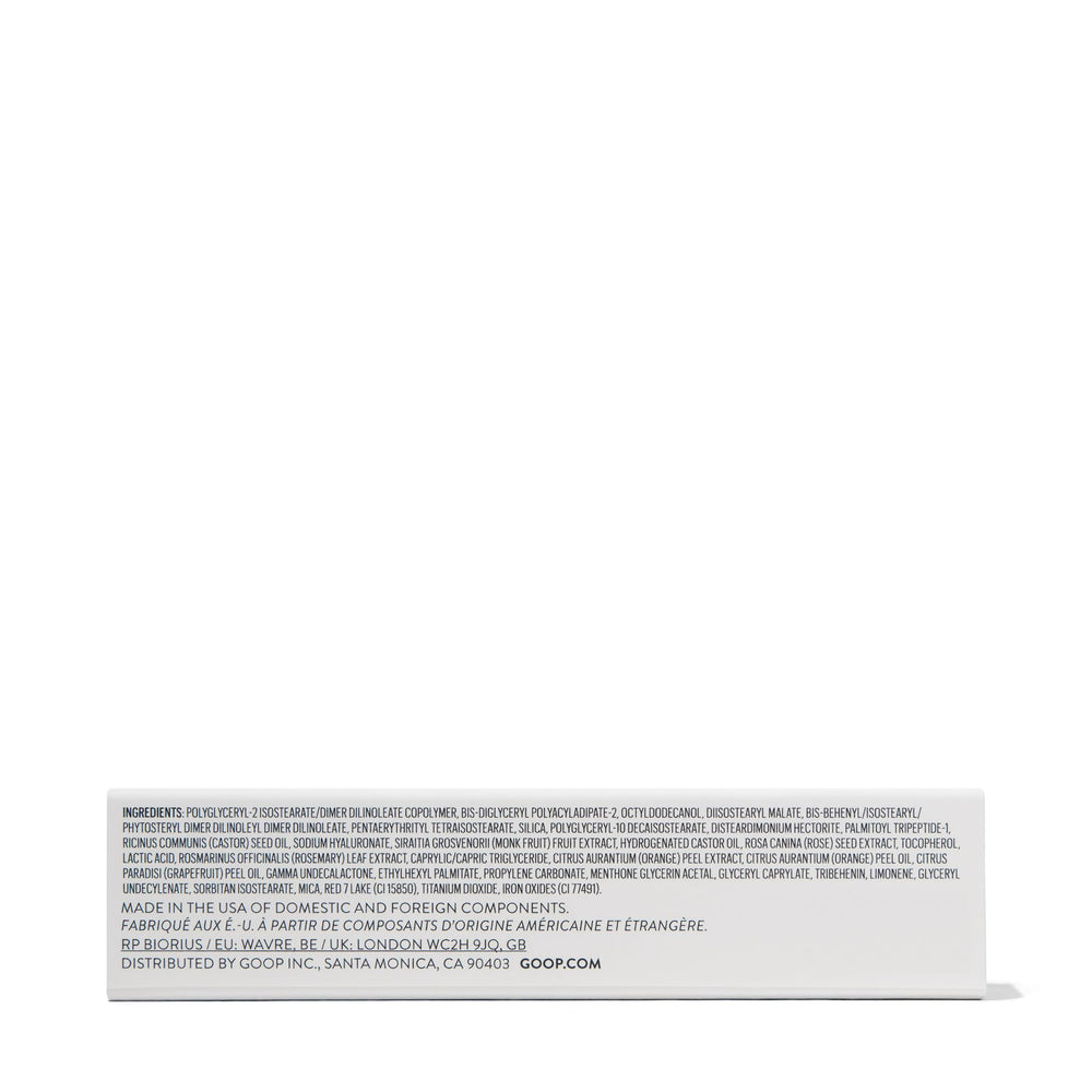 Goop Hydra-Barrier Gloss Fig shade for rich hue and hydration.