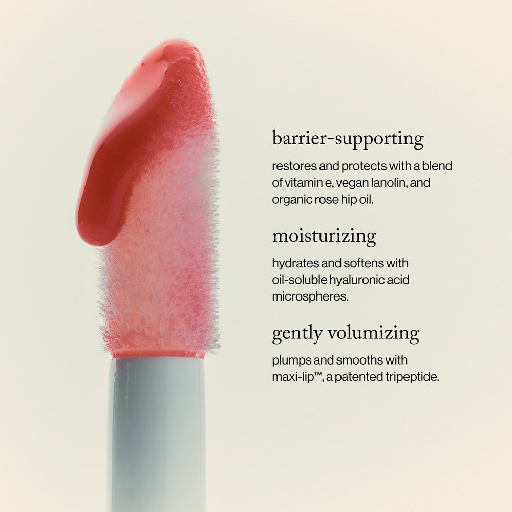 goop Hydra-Barrier lip gloss on lips reveals plump look and soft shine.