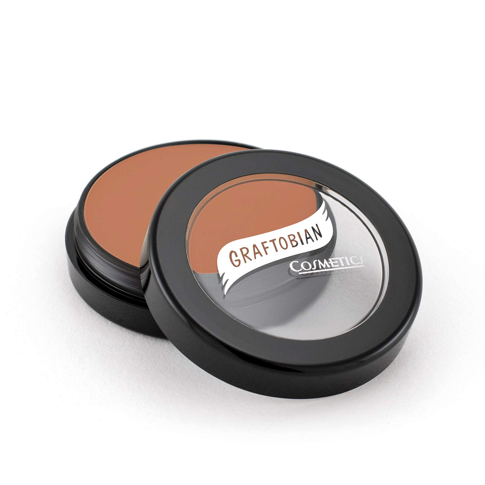 Graftobian HD Glamour Creme Auburn swatches show a natural color match for warm skin tones.