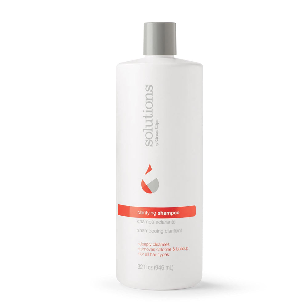 Great Clips Solutions Clarifying Shampoo bottle front; removes mineral buildup for clearer hair.