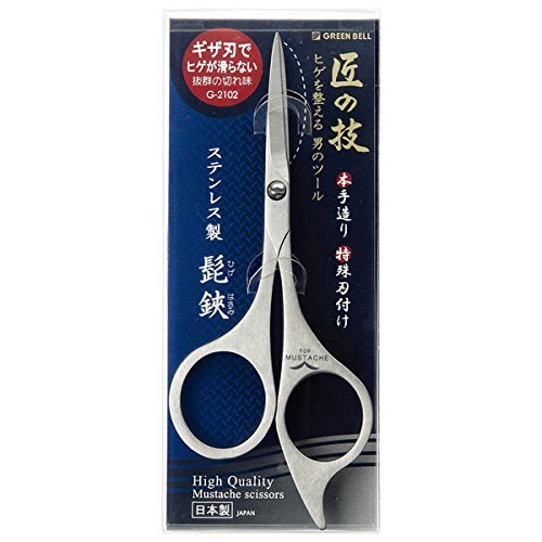 Green Bell G-2102 grooming scissors blades close-up for precise mustache and beard trimming.