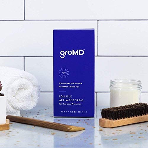 GroMD ingredients label closeup reveals DHT blockers and caffeine benefits.