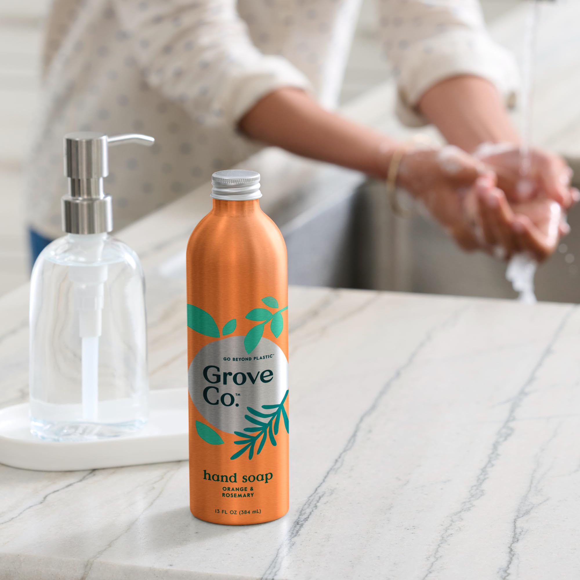 Grove Co refill poured into dispenser demonstrating a low-waste routine.