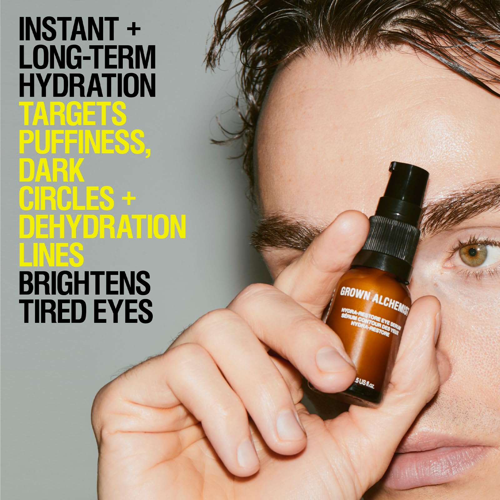 Close-up of Hydra-Restore Eye Serum dropper delivering lightweight serum