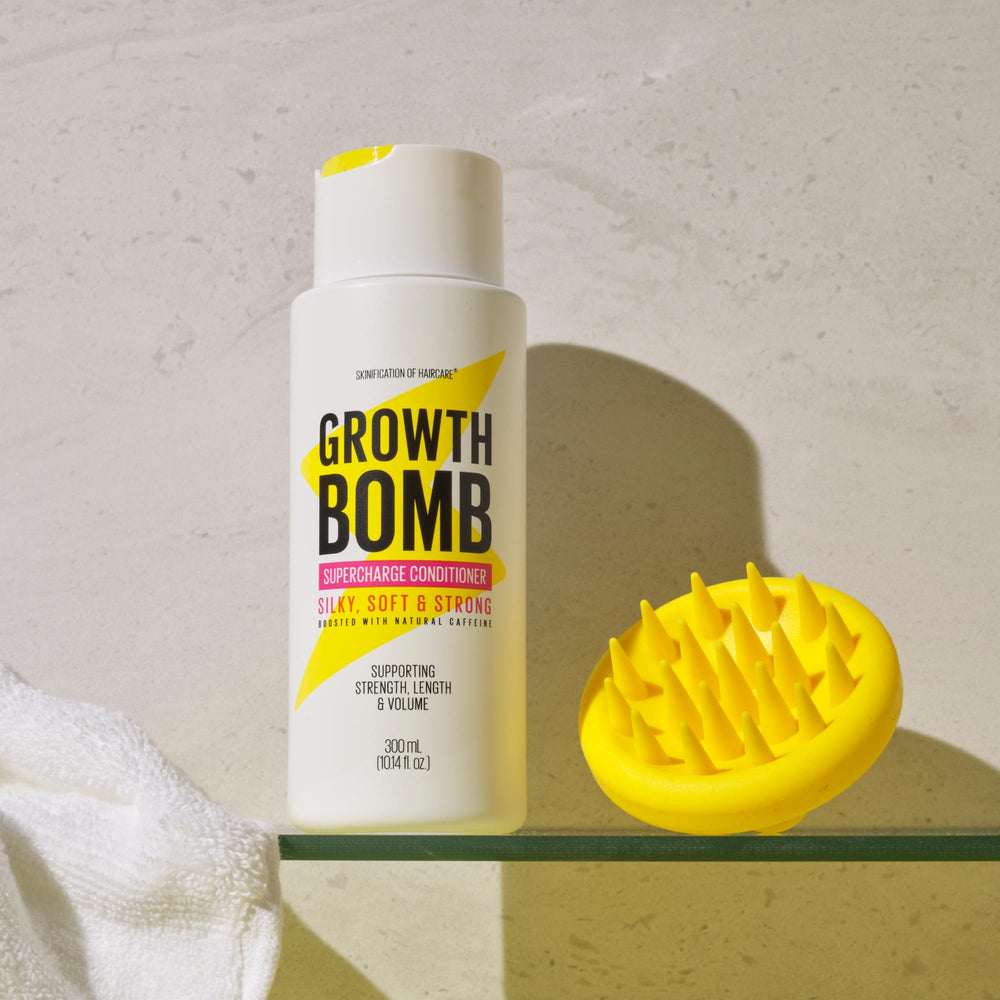 Growth Bomb Supercharge Conditioner on wet hair for detangling prep