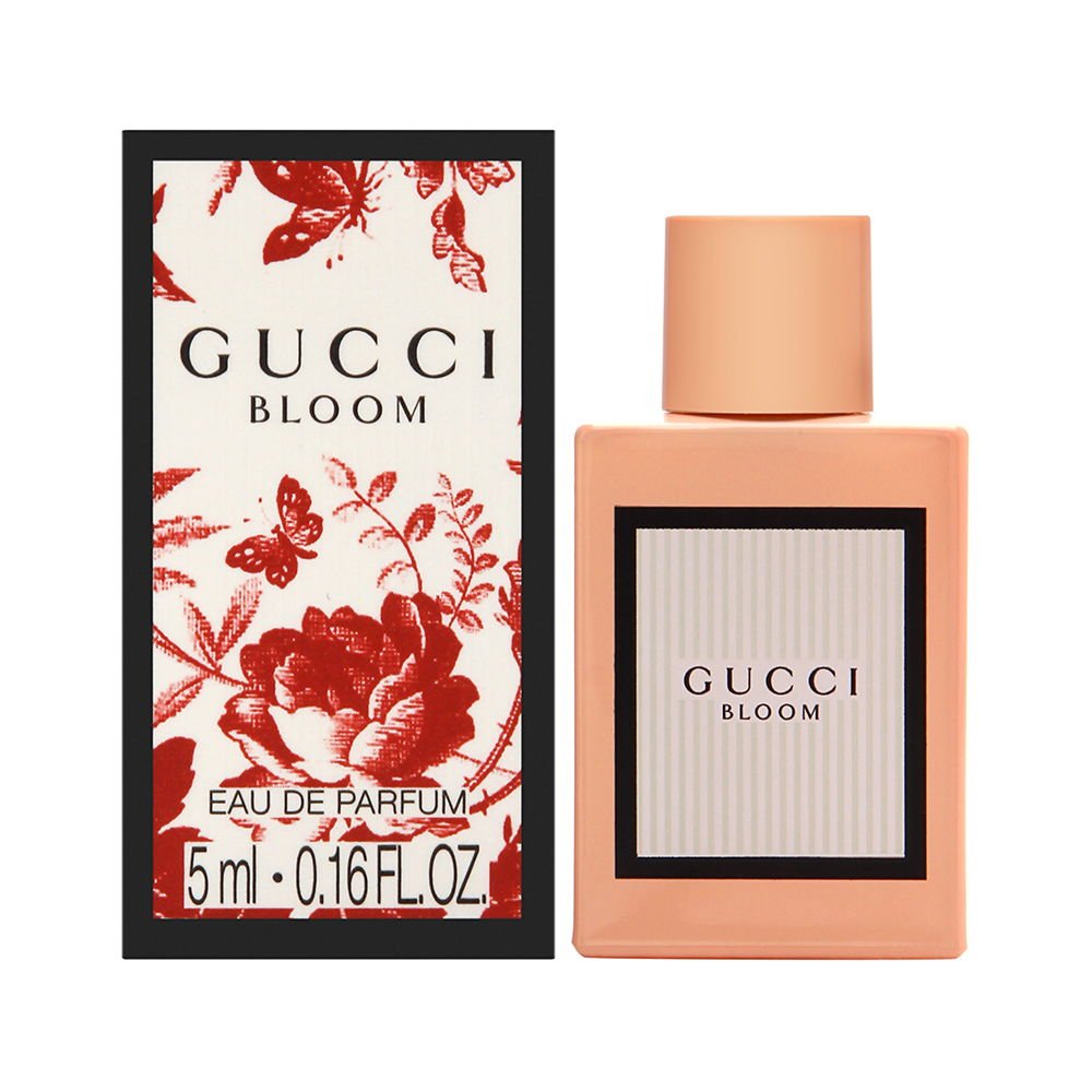 Gucci Bloom mini EDP bottle close-up, showcases a refined scent experience for daily wear.