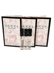 Gucci Bloom mini spray bottle in travel set, ideal for on-the-go fragrance trials.