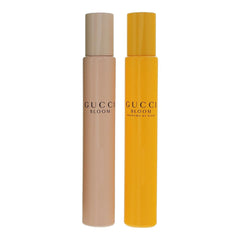Gucci Bloom travel-size rollerballs, compact for purse or on-the-go elegance.