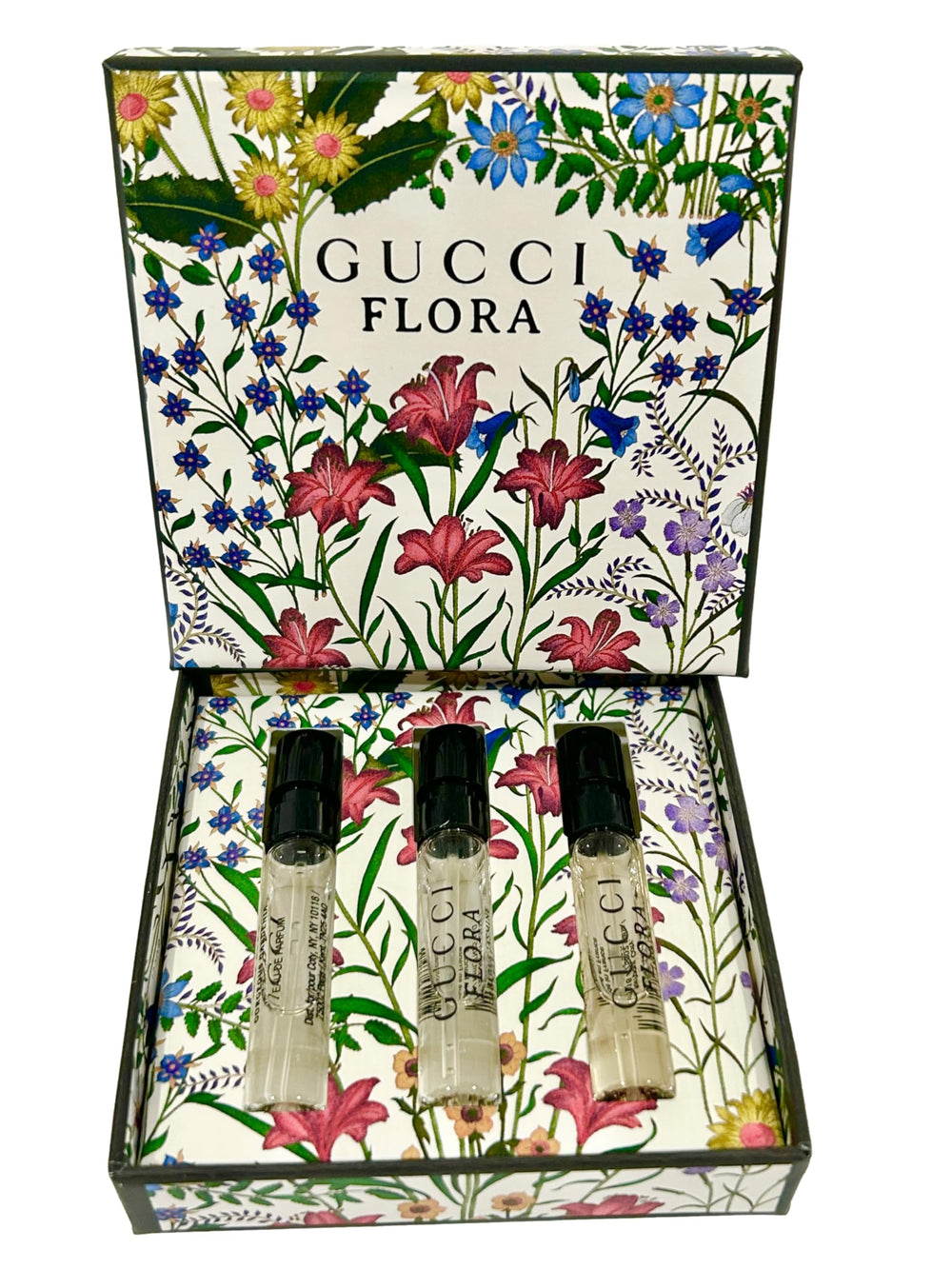Travel case holding Gucci Flora mini vials for trips