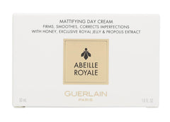 Guerlain Abeille Royale Day Cream application on cheek for a smooth, radiant look.