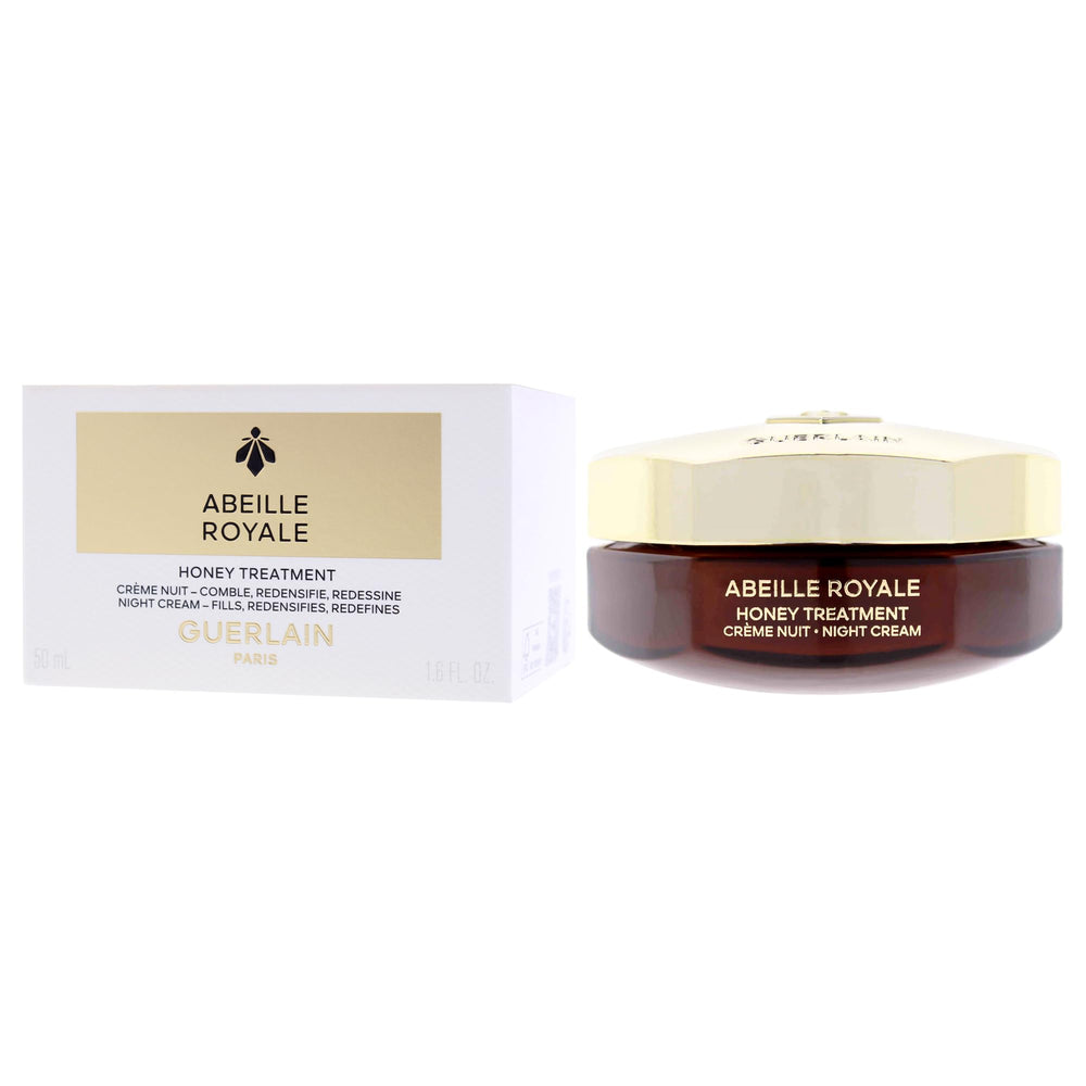 Nighttime routine scene with Guerlain Abeille Royale jar glowing softly.