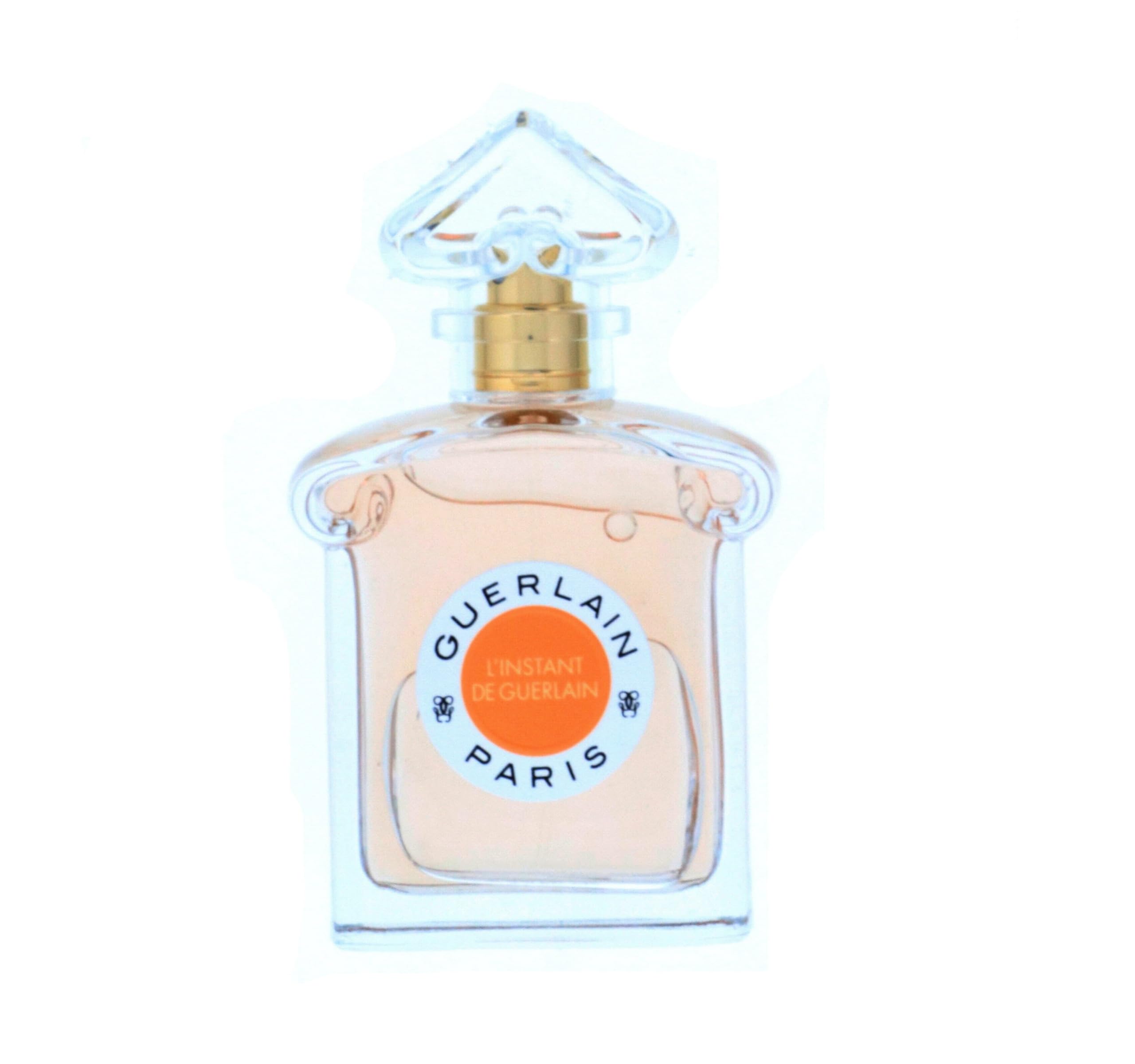 Guerlain L'Instant cap close-up, premium packaging and lasting impression.