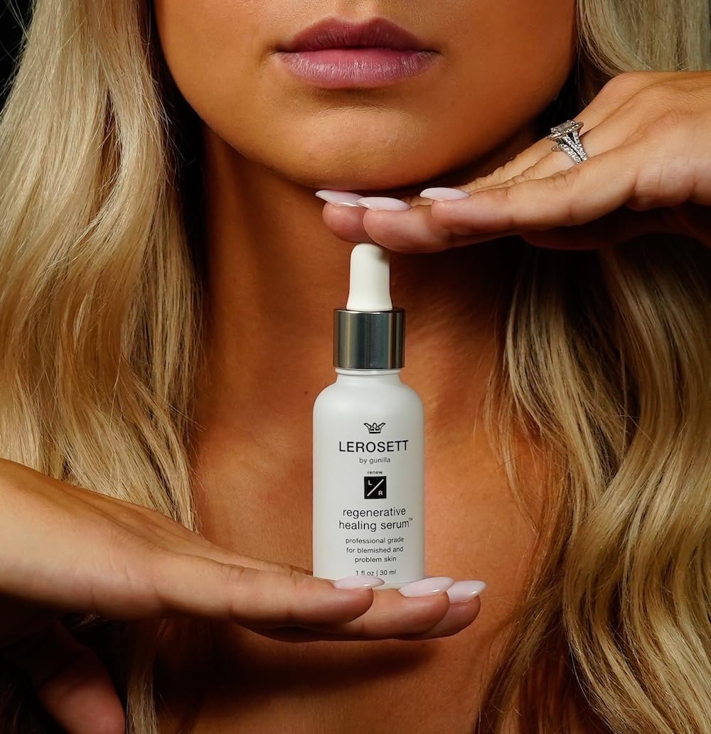 Close-up of the dropper releasing LEROSSETT serum for daily soothing application.