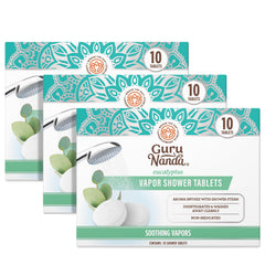 GuruNanda eucalyptus vapor shower tablet dissolving to release a refreshing aroma for mood uplift.