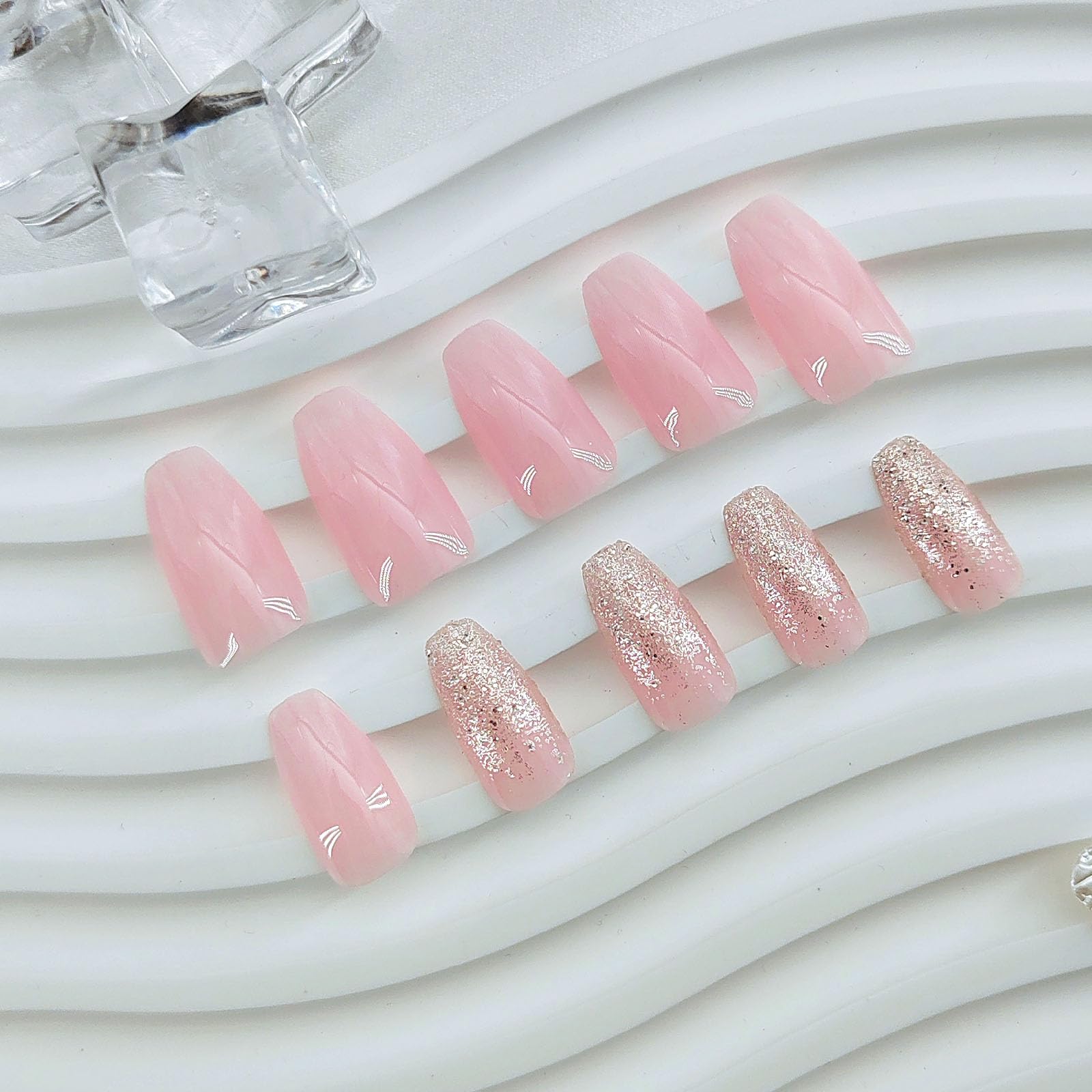 GXOIPNS jelly glue stickers included for reusable nails.