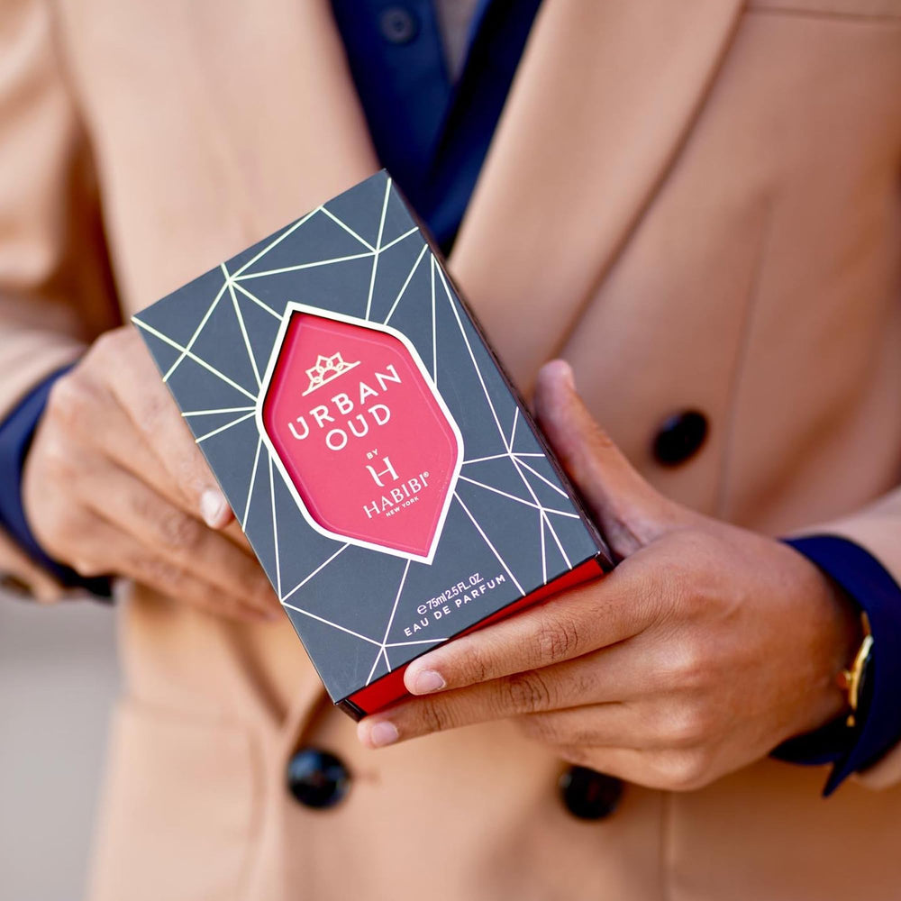 H HABIBI Urban Oud top notes visual emphasizes bright citrus and spice opening.