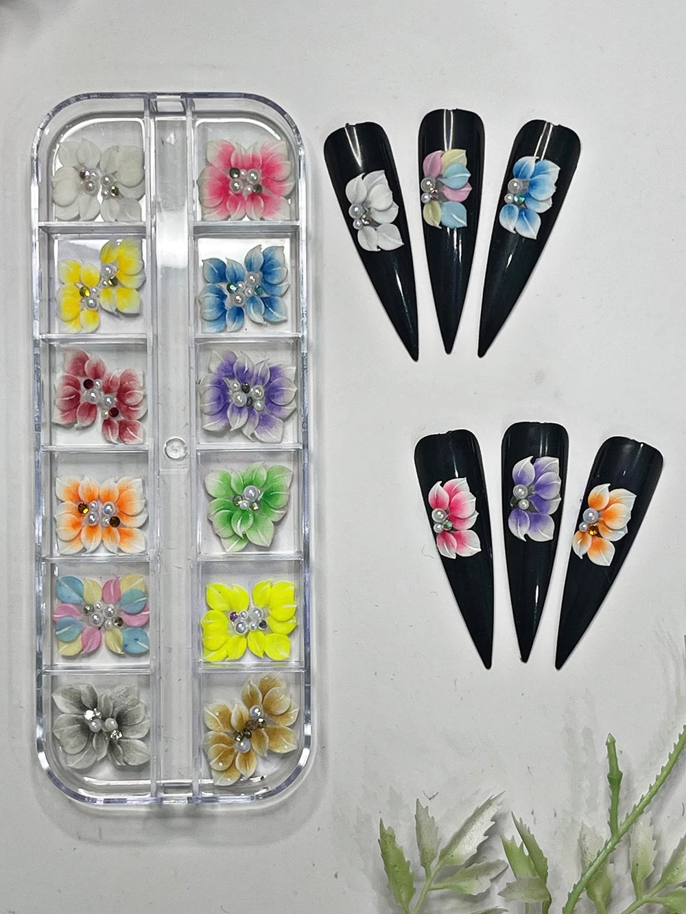 HaFLoNa 3D Ruby Glow medium flower charms add dimensional nail detail.