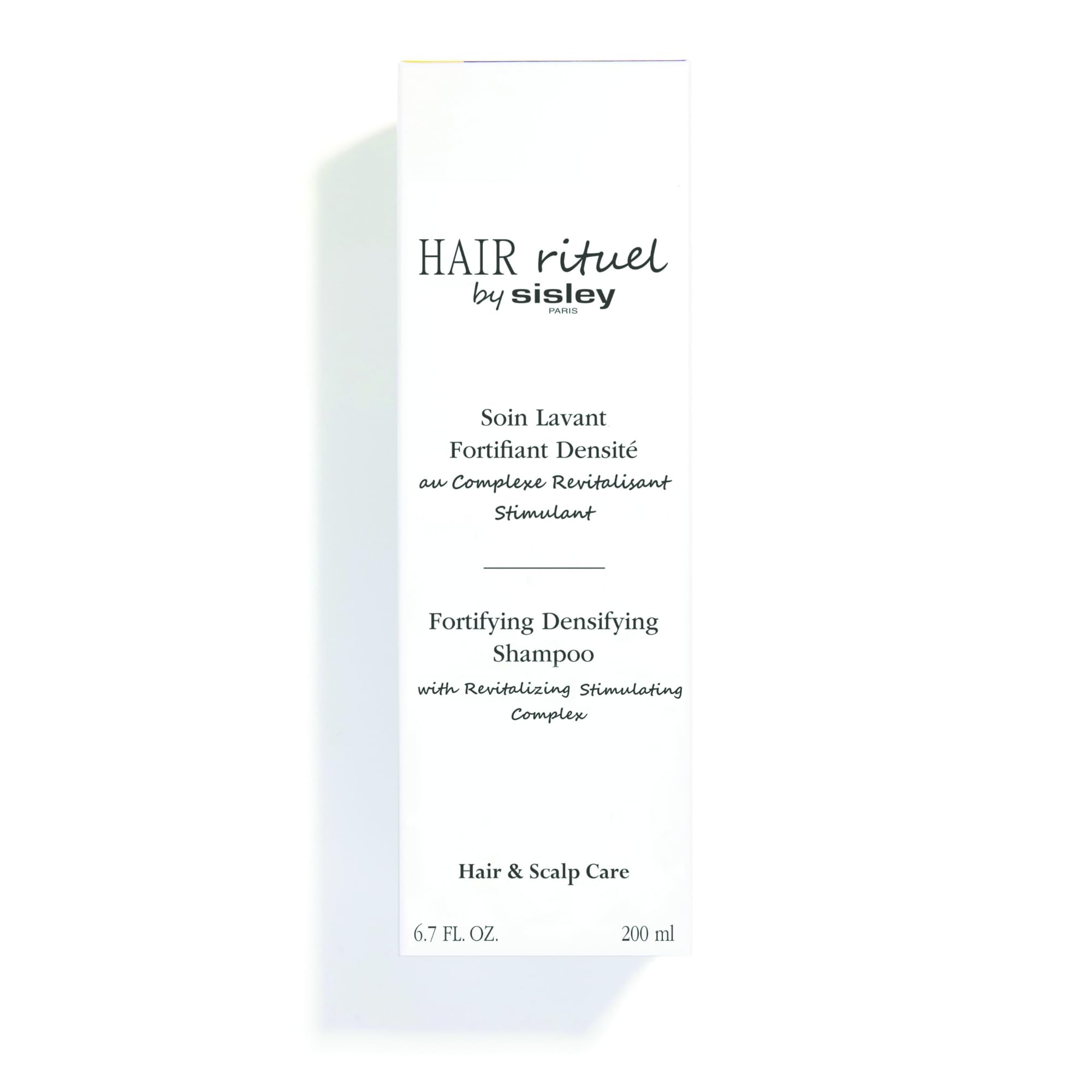 Hair Rituel by Sisley aftercare serum pairing shows complete routine