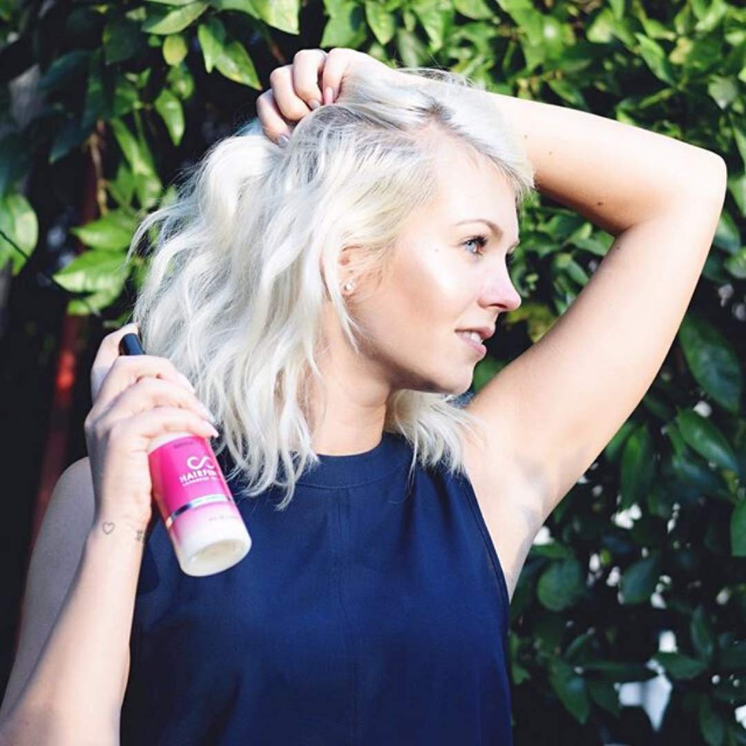Hairfinity Split-end Mender close-up on improved strand condition.